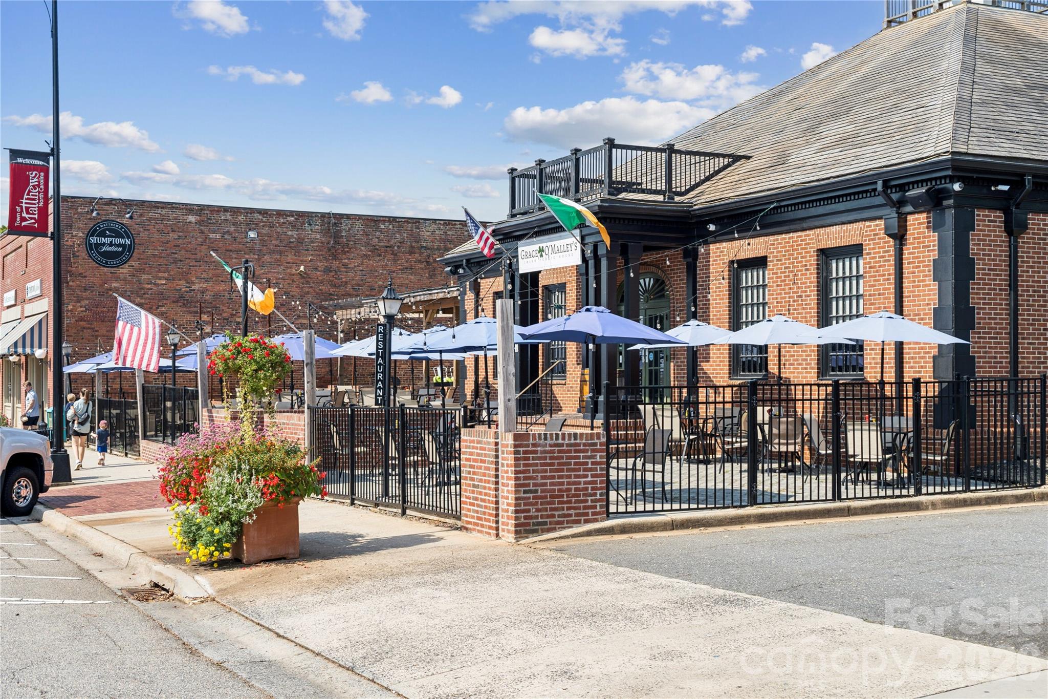 416 Alameda Way Matthews, NC 28104 - Photo 34 of 36 a front view of a building with street