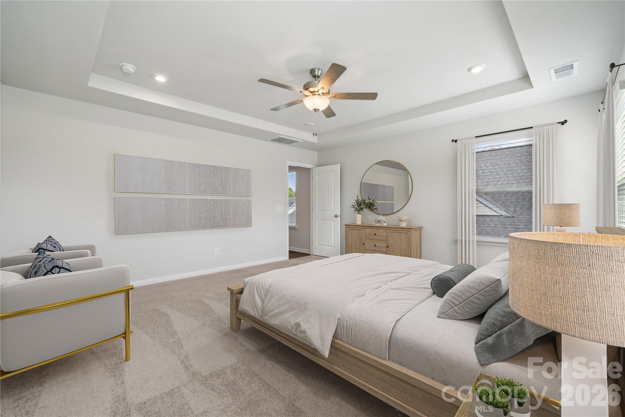 416 Alameda Way Matthews, NC 28104 - Photo 5 of 36 a bedroom with a bed dresser and a window