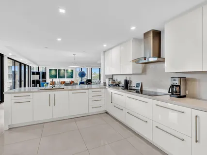 a kitchen with cabinets and sink