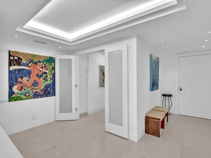 a utility room with sink dryer and washer
