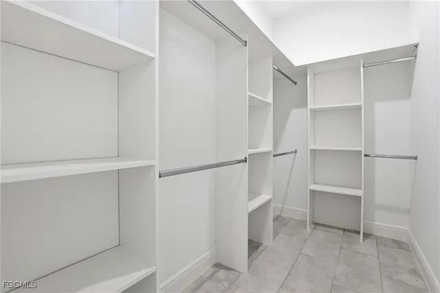 a view of an empty walk in closet