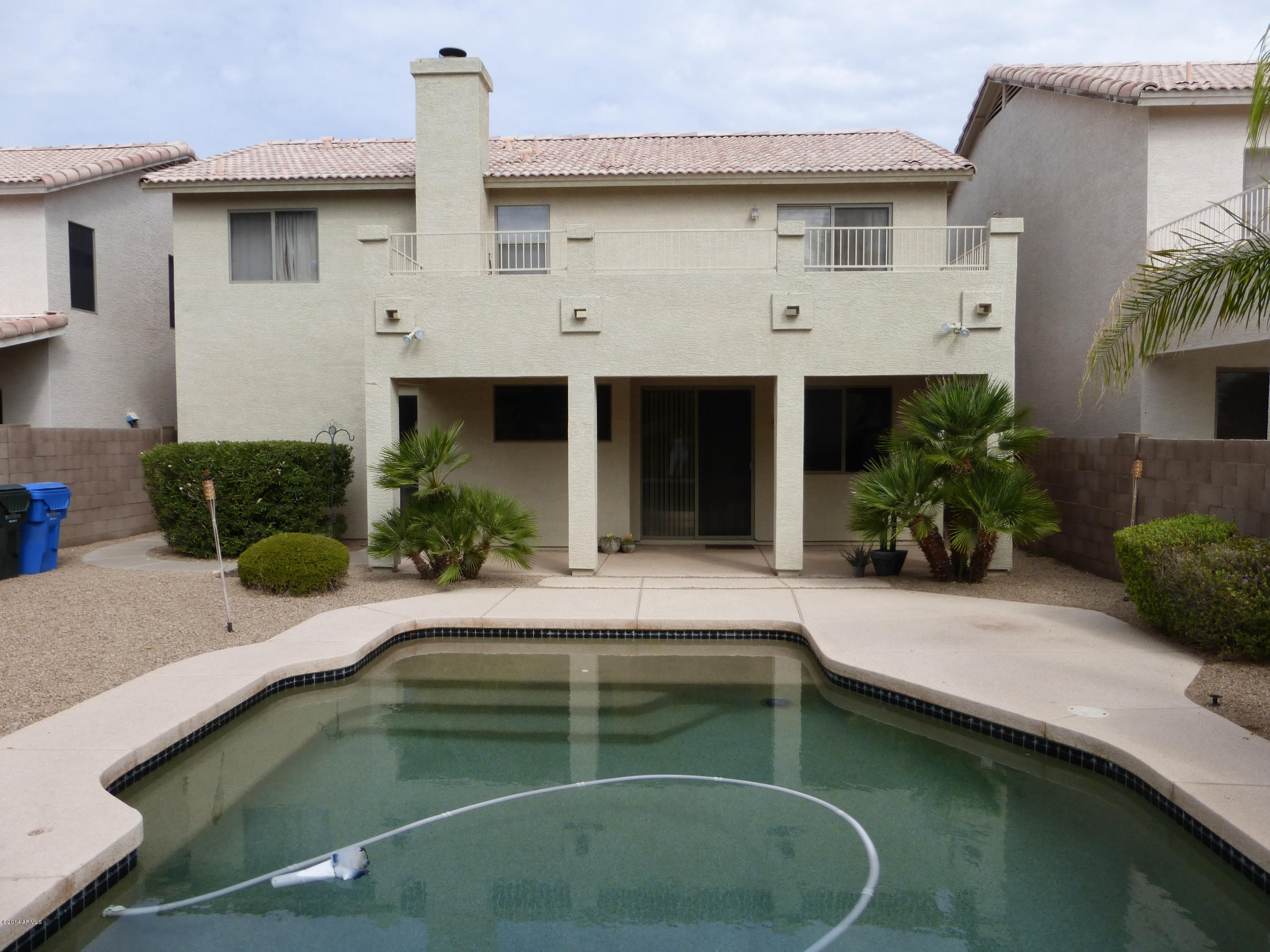 3927 East Agave Road Phoenix, AZ 85044 - Photo 12 of 21 a house with swimming pool
