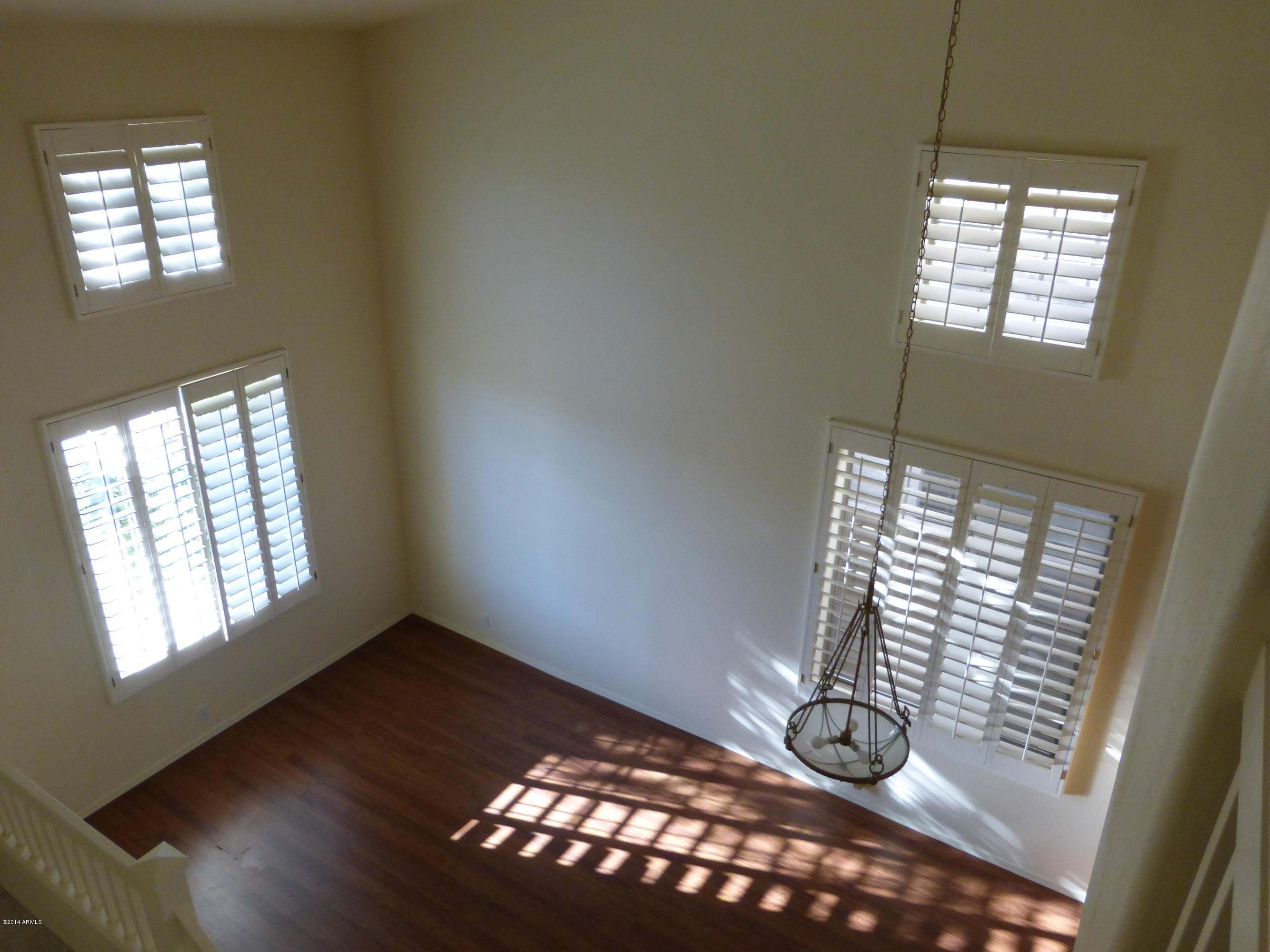 3927 East Agave Road Phoenix, AZ 85044 - Photo 2 of 21 a view of an empty room and window