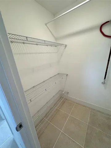 a view of a room with racks on the wall