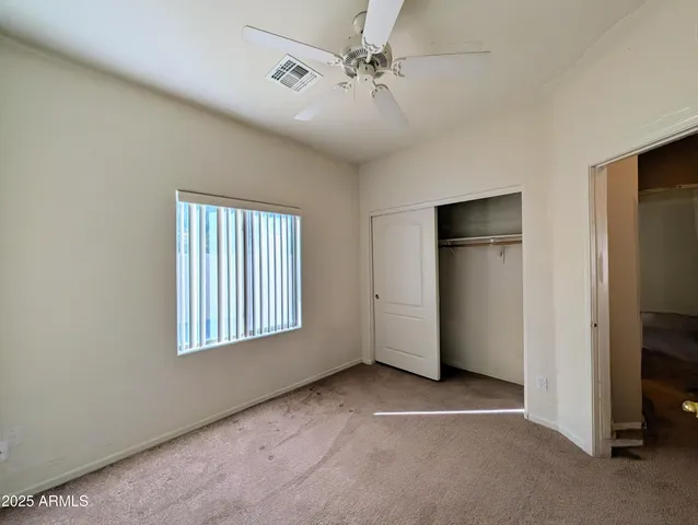 a bathroom with a tub sink double and window