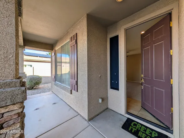a view of a livingroom with a staircase