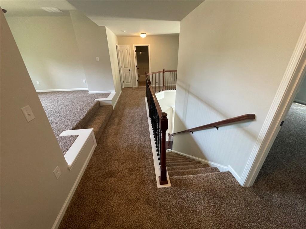 4810 Haysboro Way Cumming, GA 30040 - Photo 14 of 48 a view of a hallway with staircase