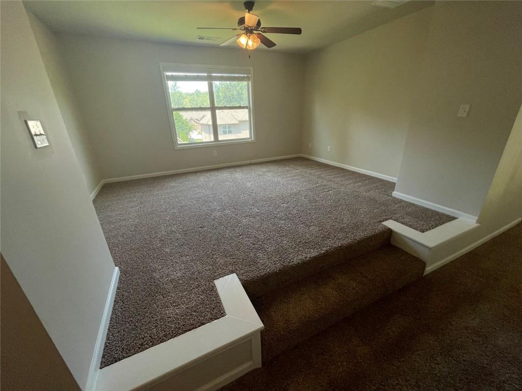 4810 Haysboro Way Cumming, GA 30040 - Photo 16 of 48 a view of livingroom with window