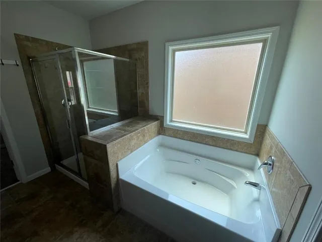 a view of kitchen with sink washer and dryer