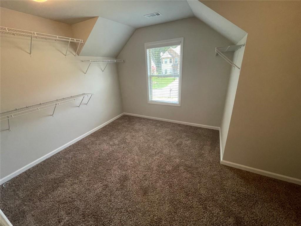 4810 Haysboro Way Cumming, GA 30040 - Photo 20 of 48 an empty room with windows