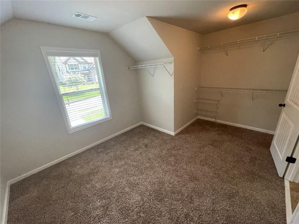 4810 Haysboro Way Cumming, GA 30040 - Photo 21 of 48 an empty room with windows