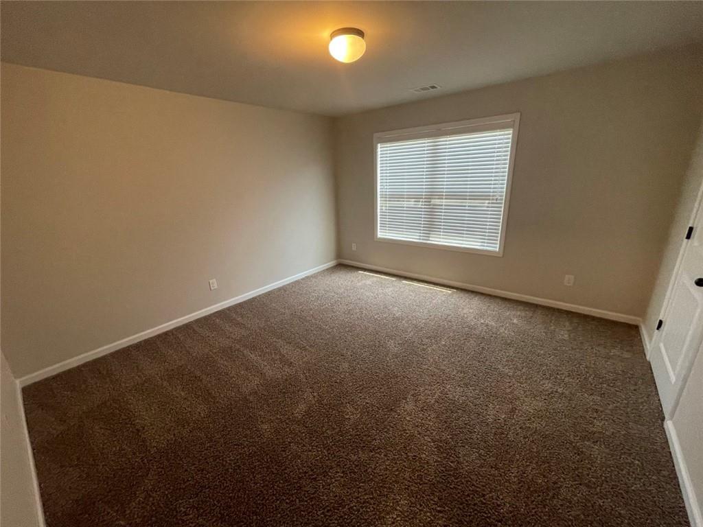 4810 Haysboro Way Cumming, GA 30040 - Photo 23 of 48 an empty room with a window