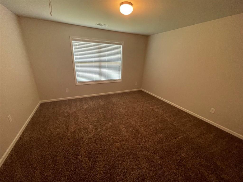 4810 Haysboro Way Cumming, GA 30040 - Photo 26 of 48 an empty room with a window