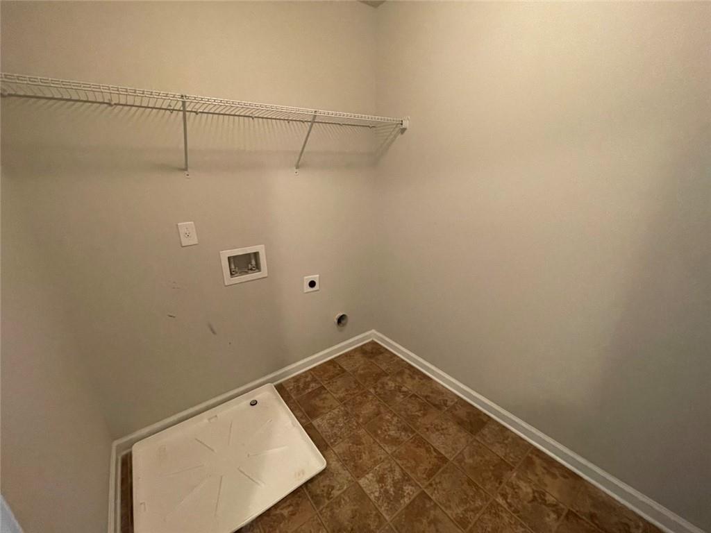 4810 Haysboro Way Cumming, GA 30040 - Photo 27 of 48 a view of a room with racks on the wall