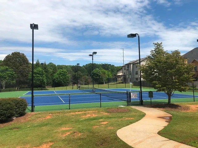 a view of a playground with a patio