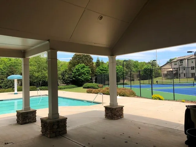 a view of outdoor space and basketball court