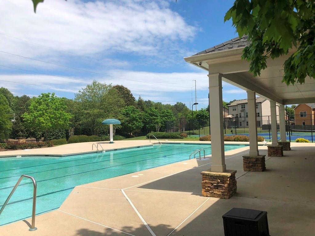 4810 Haysboro Way Cumming, GA 30040 - Photo 35 of 48 a view of a playground with a patio