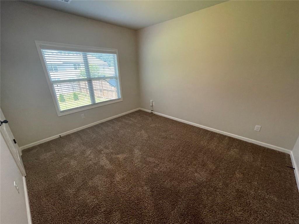 4810 Haysboro Way Cumming, GA 30040 - Photo 10 of 48 an empty room with a window