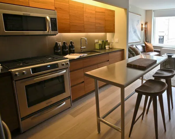 a kitchen with a stove and a microwave