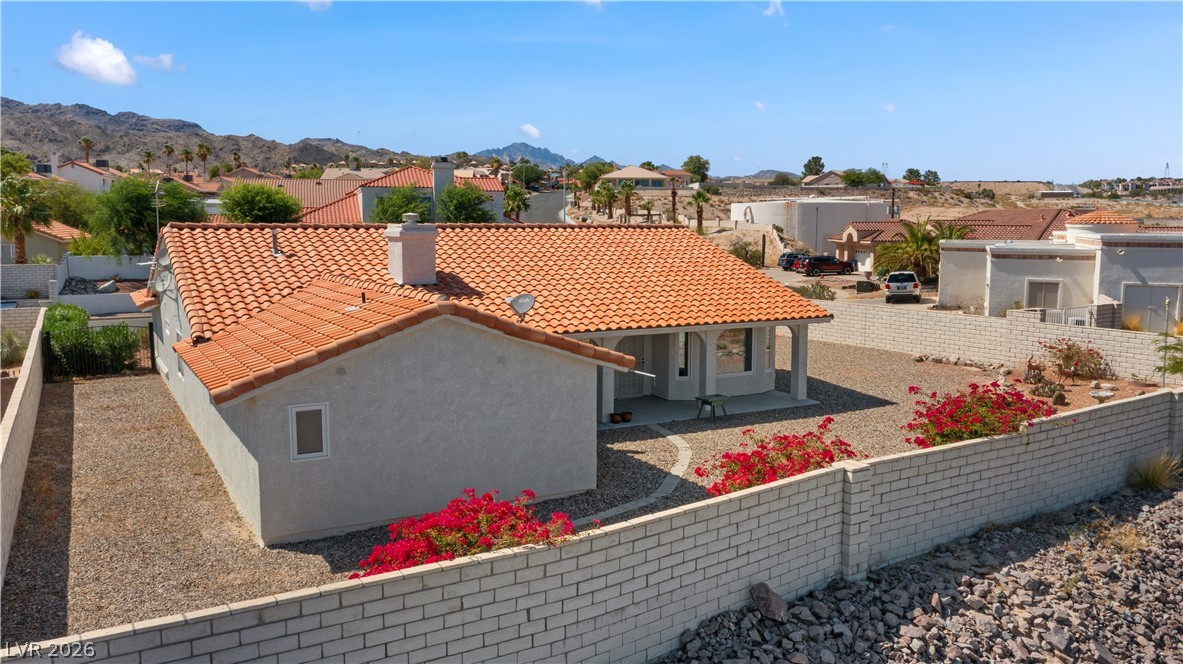 2055 Cholla Way Laughlin, NV 89029 - Photo 81 of 87 Terracotta tiled roof and walled yard enhance this property's desert-oasis charm.