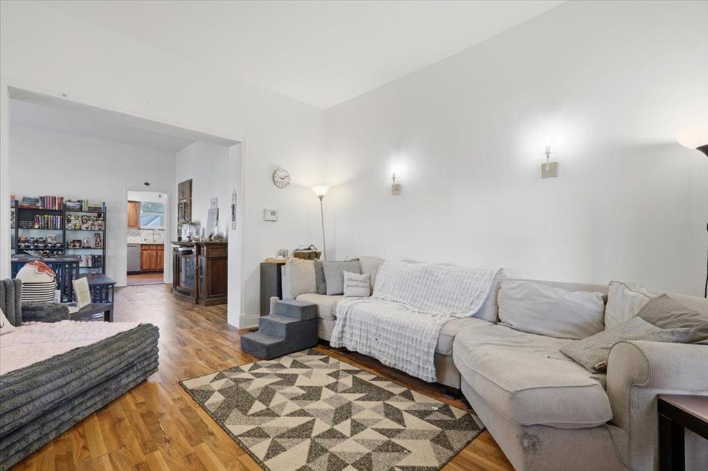 15 Division Street Pittsburgh, PA 15205 - Photo 5 of 44 a living room with furniture and a couch