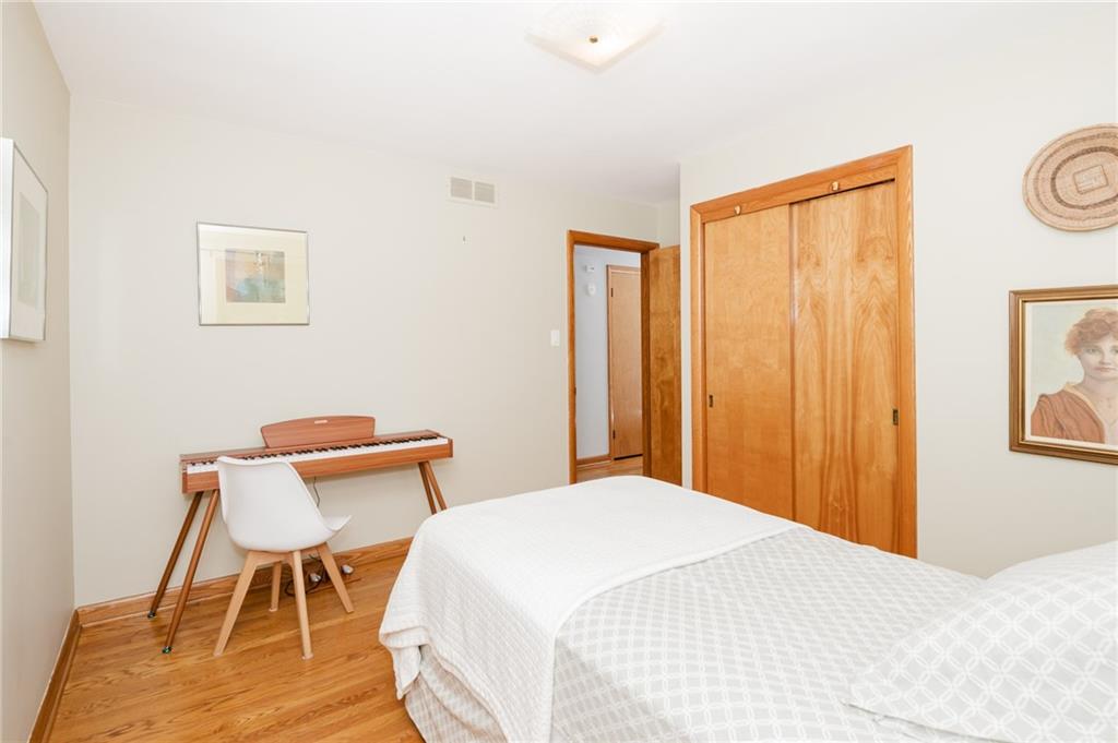 555 North 9th Street Indiana, PA 15701 - Photo 22 of 38 a bedroom with a bed and a table