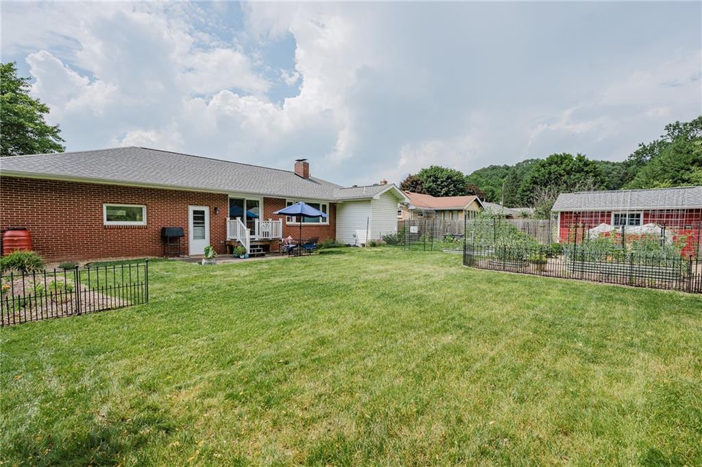 555 North 9th Street Indiana, PA 15701 - Photo 31 of 38 a front view of house with yard and green space