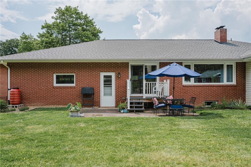 555 North 9th Street Indiana, PA 15701 - Photo 34 of 38 a front view of house with yard and outdoor seating