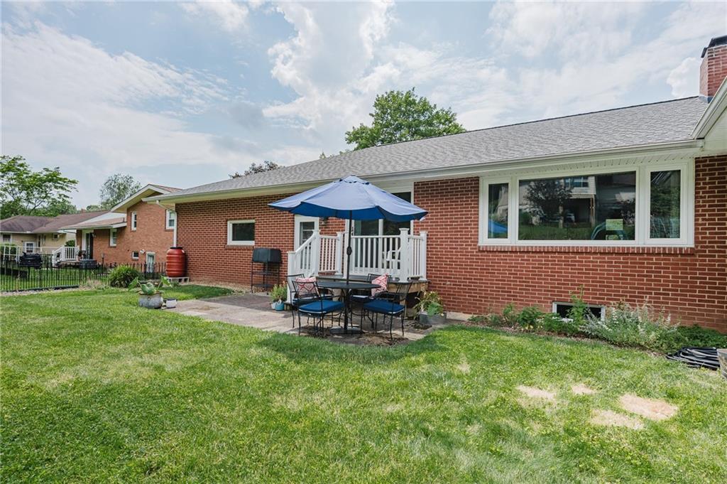 555 North 9th Street Indiana, PA 15701 - Photo 36 of 38 a front view of a house with garden