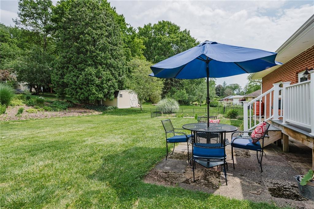 555 North 9th Street Indiana, PA 15701 - Photo 37 of 38 a view of a table and chairs under an umbrella