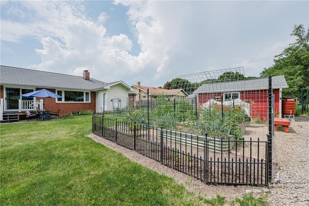 555 North 9th Street Indiana, PA 15701 - Photo 38 of 38 a view of a house with a yard and potted plants