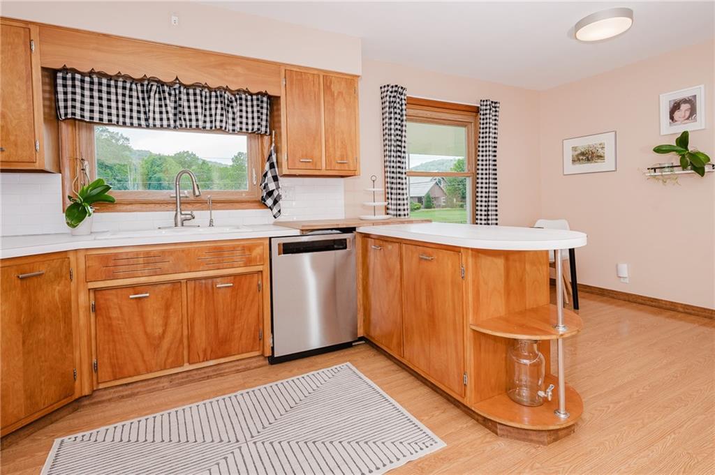 555 North 9th Street Indiana, PA 15701 - Photo 9 of 38 a kitchen with a sink cabinets and window