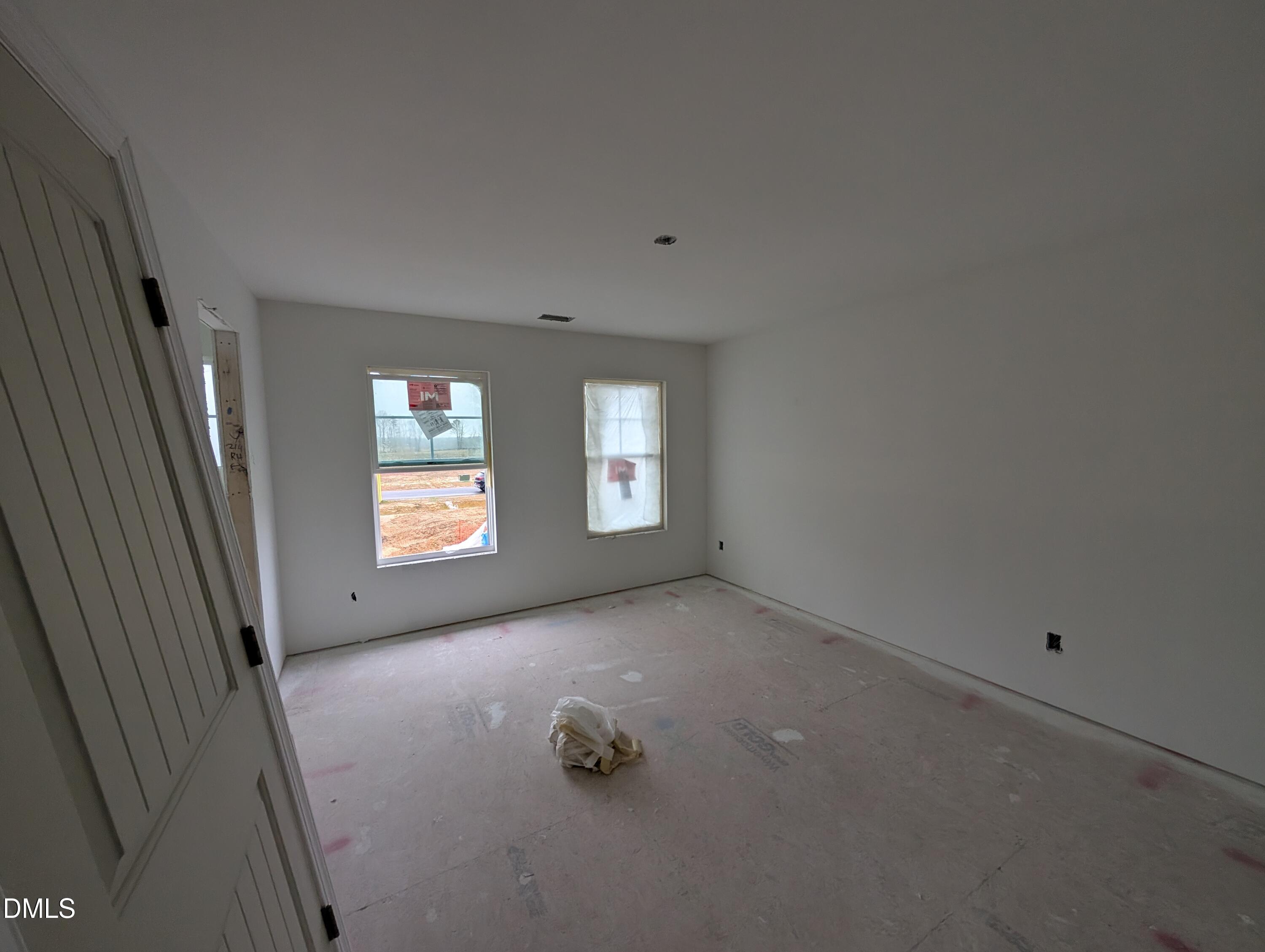 216 Cedar Rdg Trail Angier, NC 27501 - Photo 13 of 18 an empty room with windows