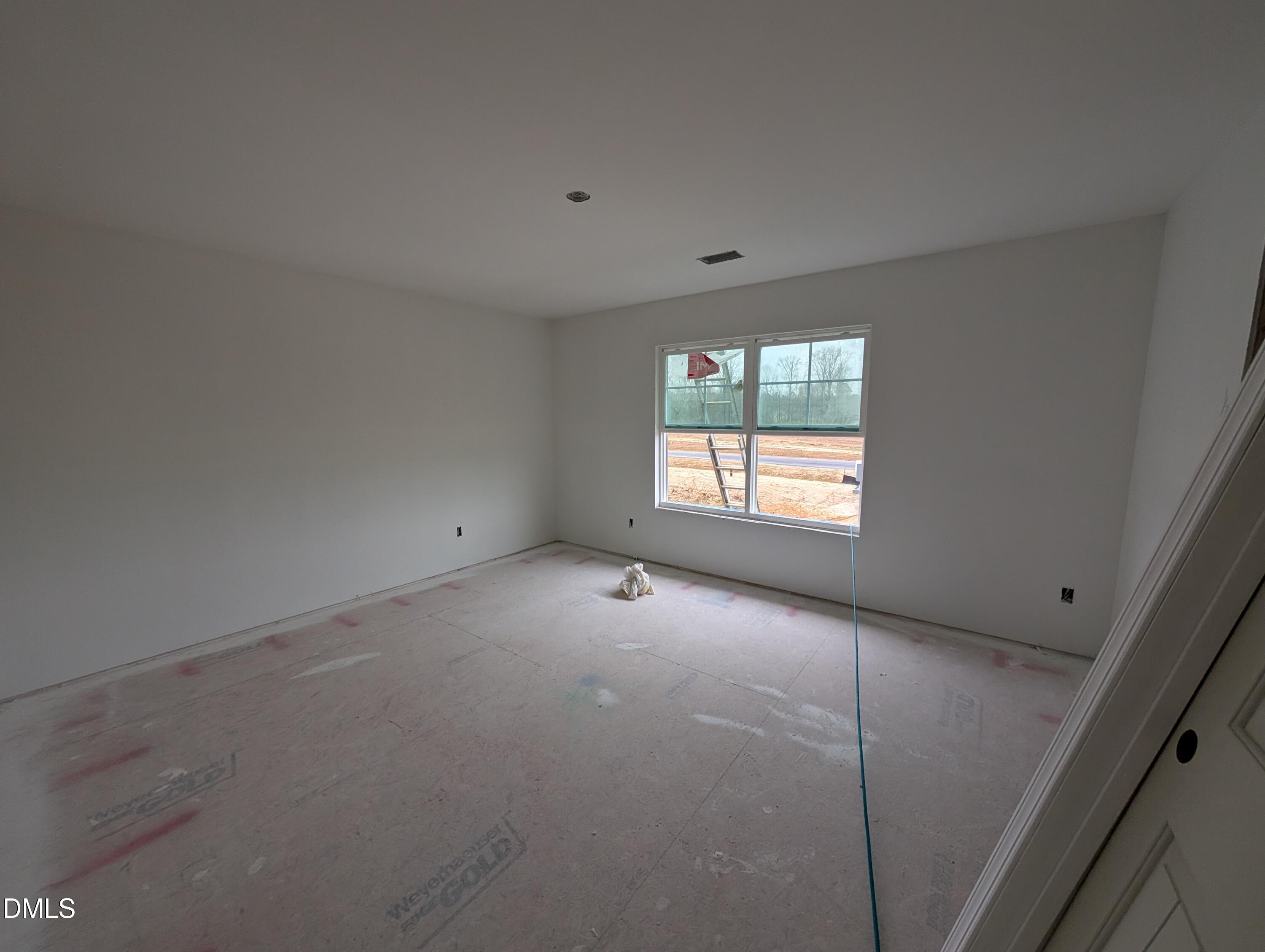 216 Cedar Rdg Trail Angier, NC 27501 - Photo 15 of 18 a view of an empty room with a window