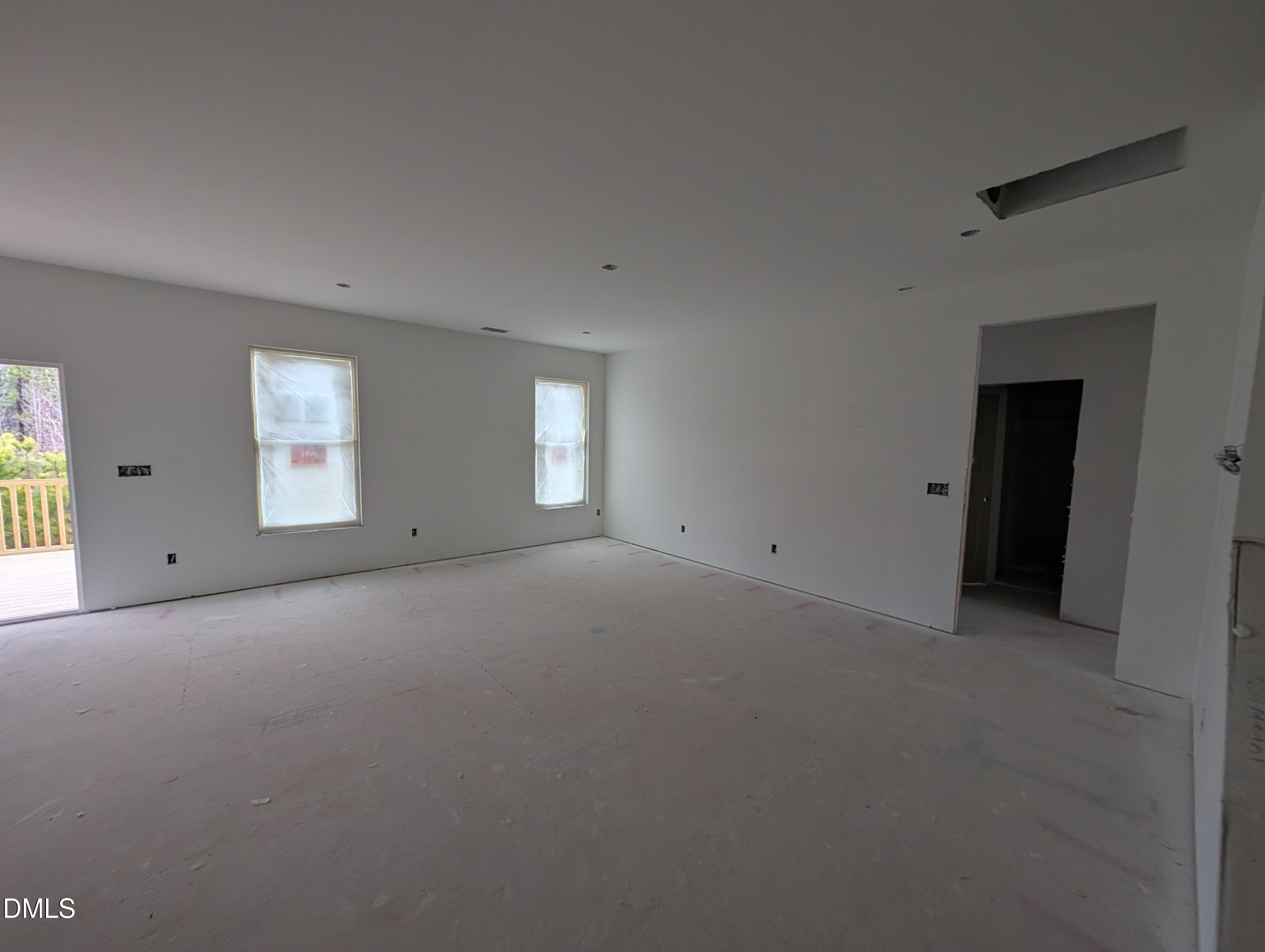 216 Cedar Rdg Trail Angier, NC 27501 - Photo 4 of 18 an empty room with windows and closet