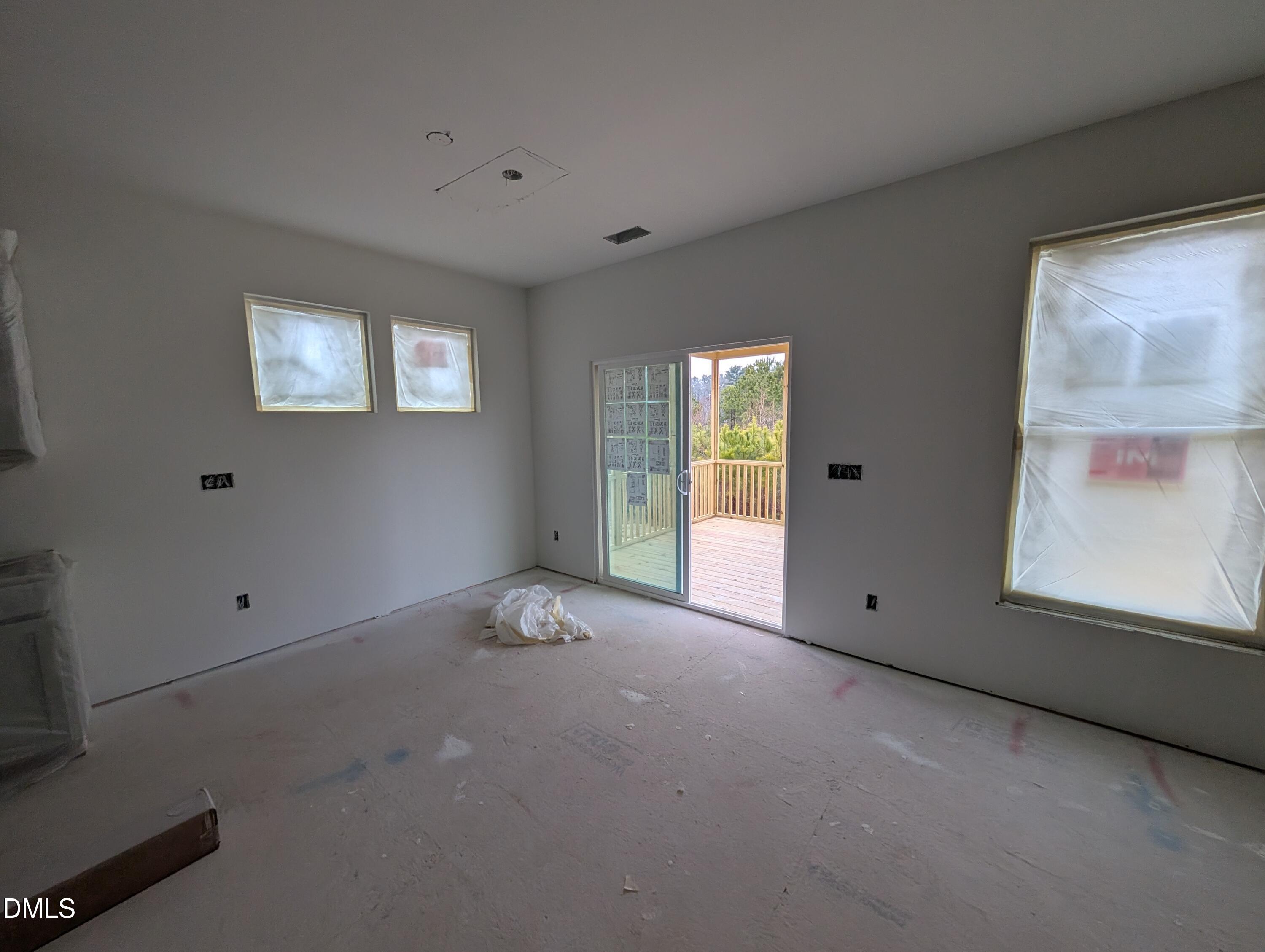 216 Cedar Rdg Trail Angier, NC 27501 - Photo 6 of 18 an empty room with windows and closet
