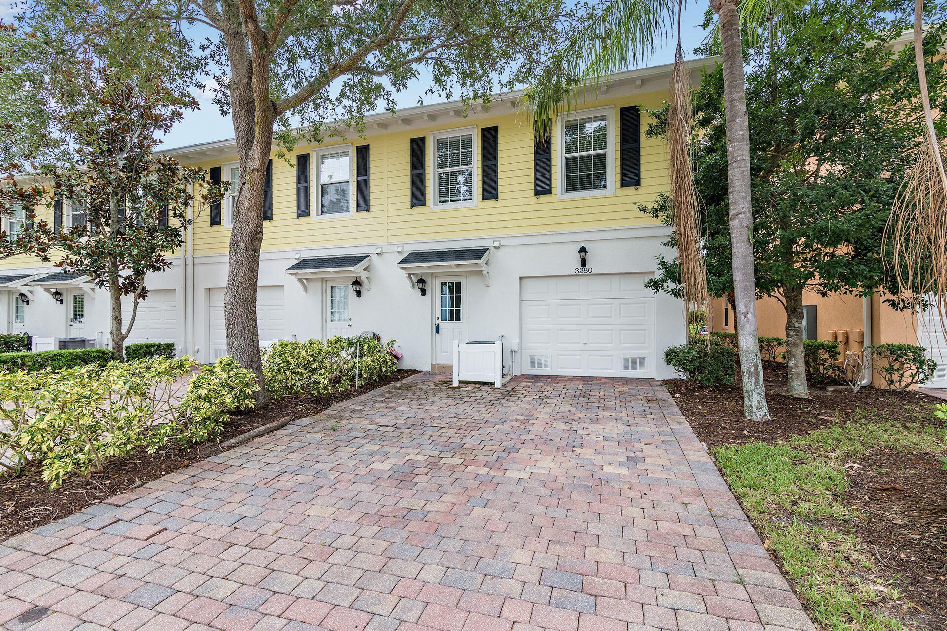 3280 West Community Drive Jupiter, FL 33458 - Photo 23 of 37 Garage and Driveway