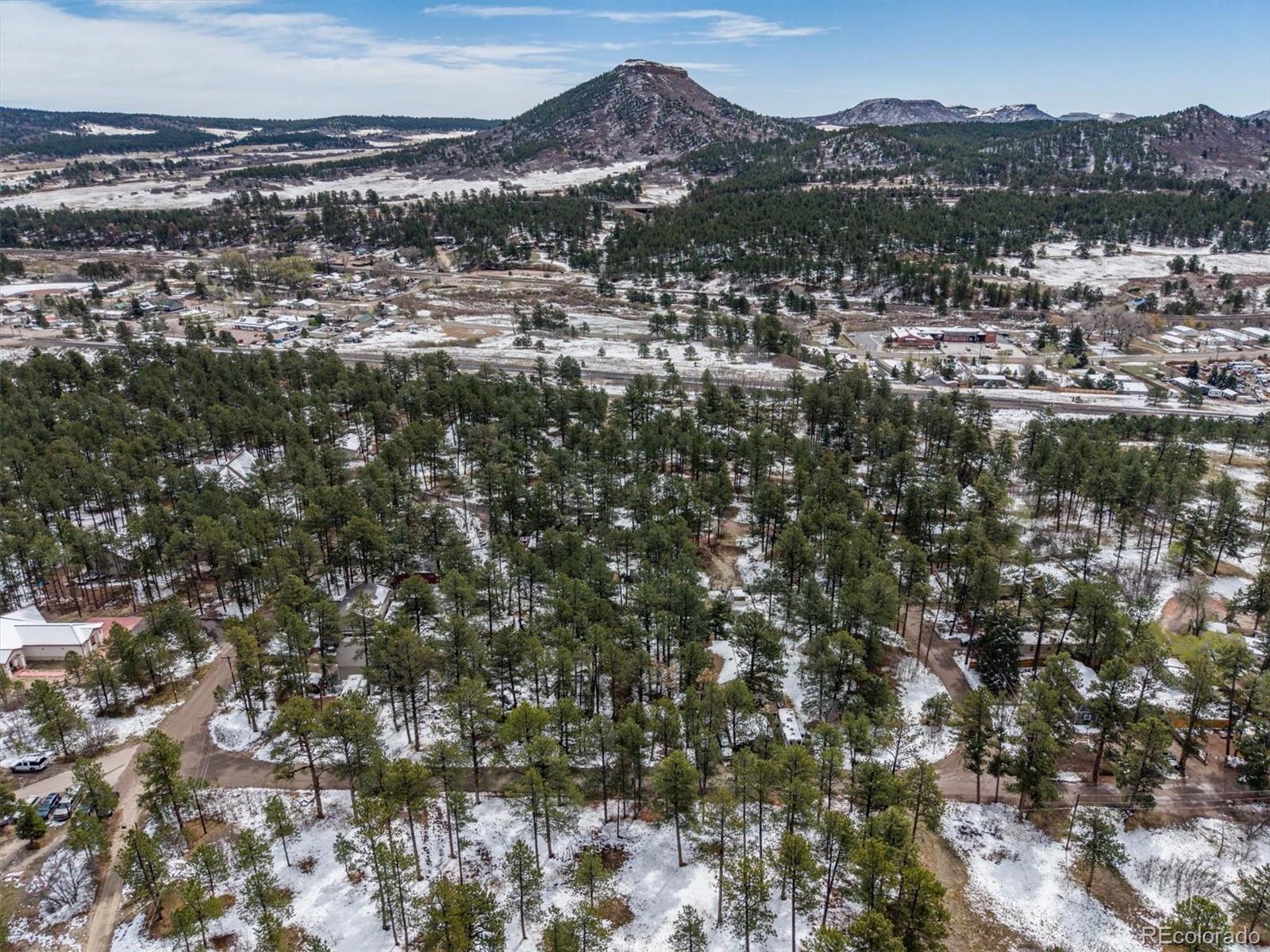 9231 South Curtis Road Larkspur, CO 80118 - Photo 13 of 16 a view of a city with mountain