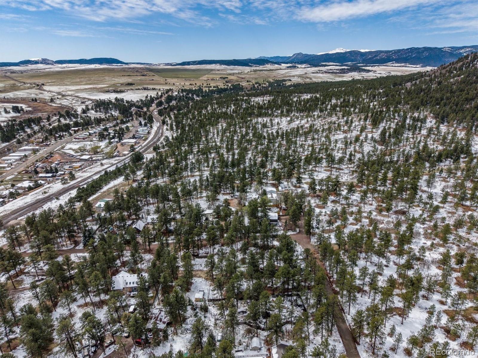 9231 South Curtis Road Larkspur, CO 80118 - Photo 16 of 16 a view of city and ocean