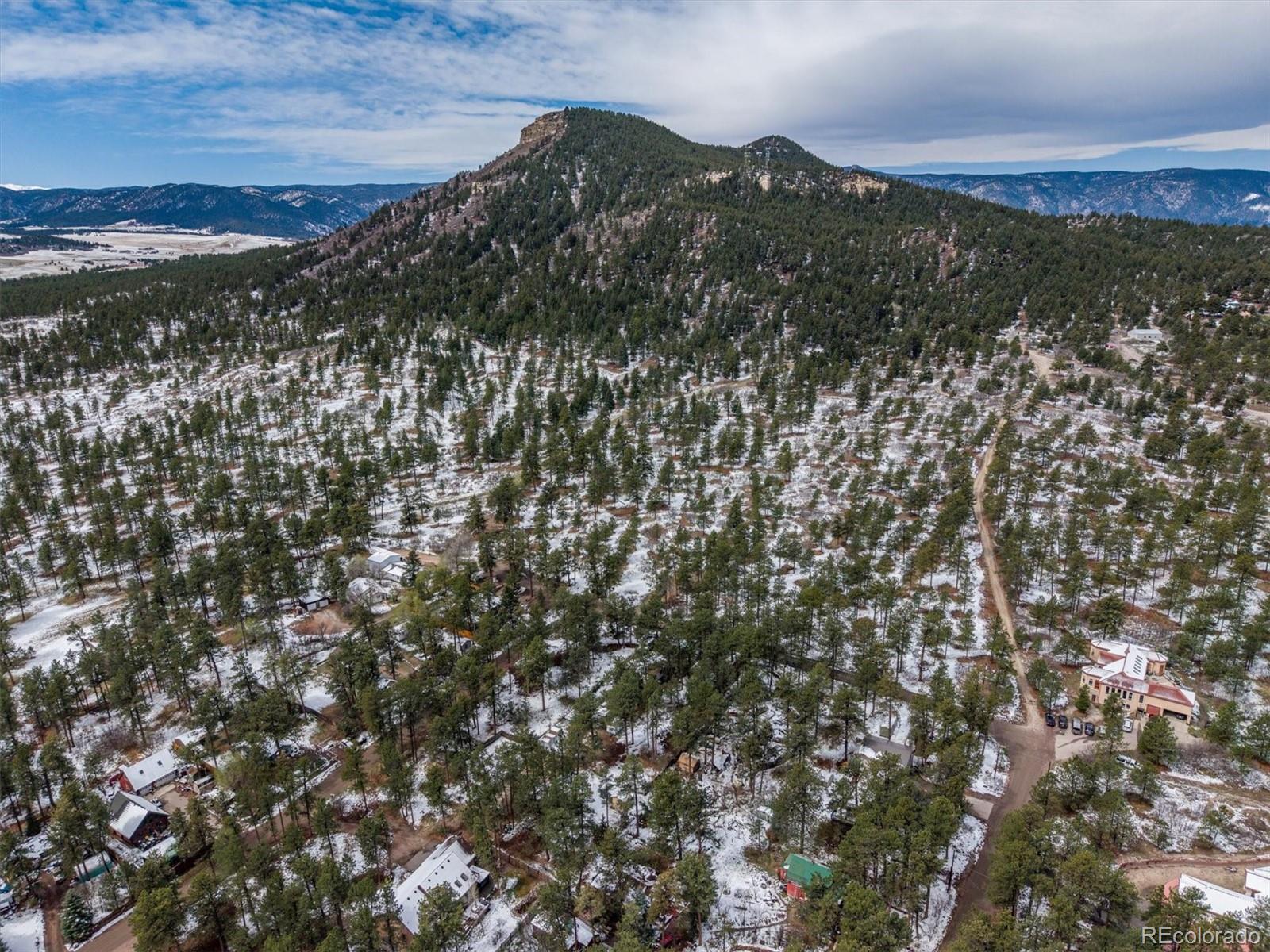 9231 South Curtis Road Larkspur, CO 80118 - Photo 3 of 16 a view of mountain view with mountains in the background
