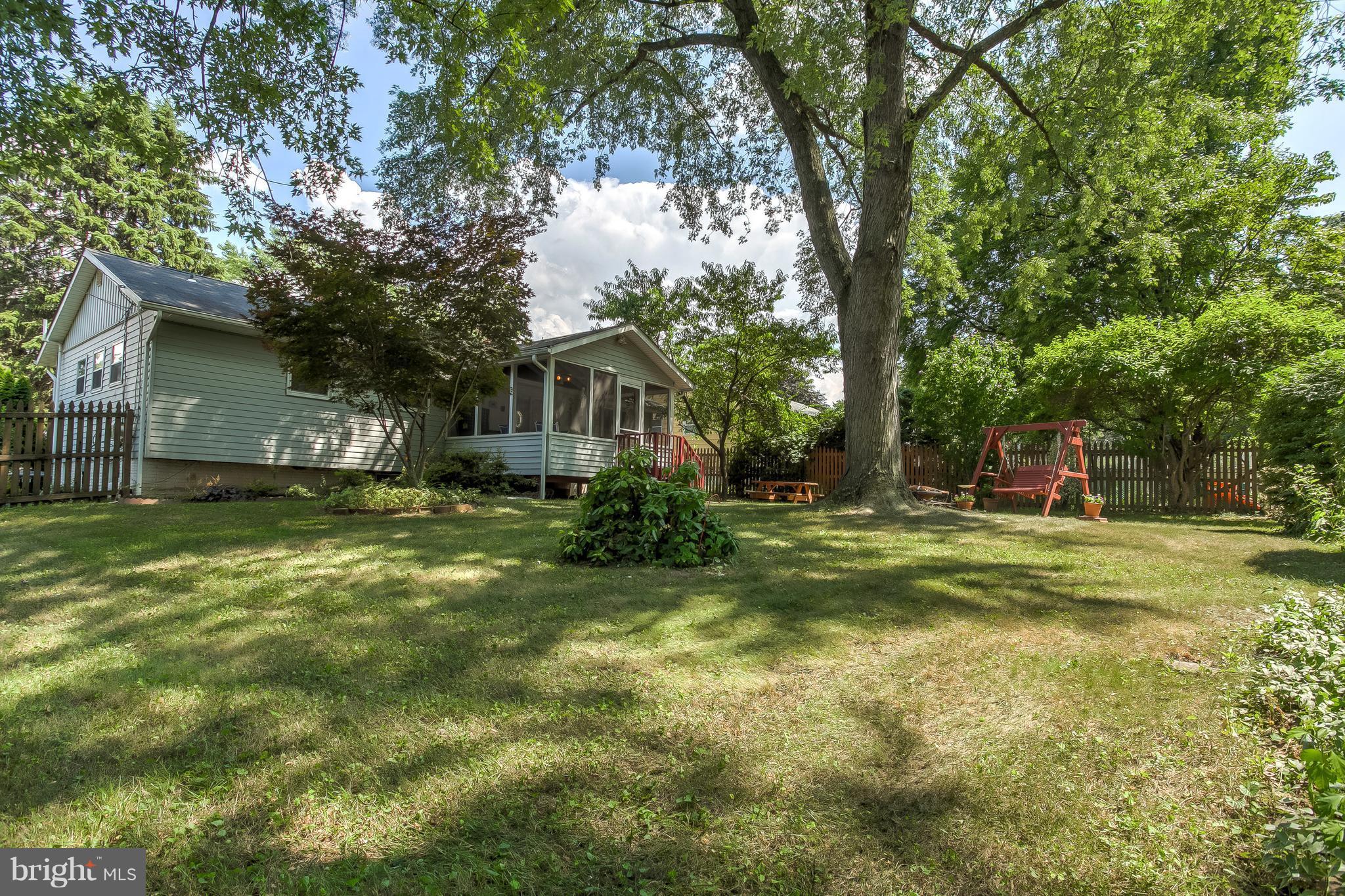 332 Timber Grove Road Reisterstown, MD 21136 - Photo 22 of 23 a view of a house with a yard and sitting area