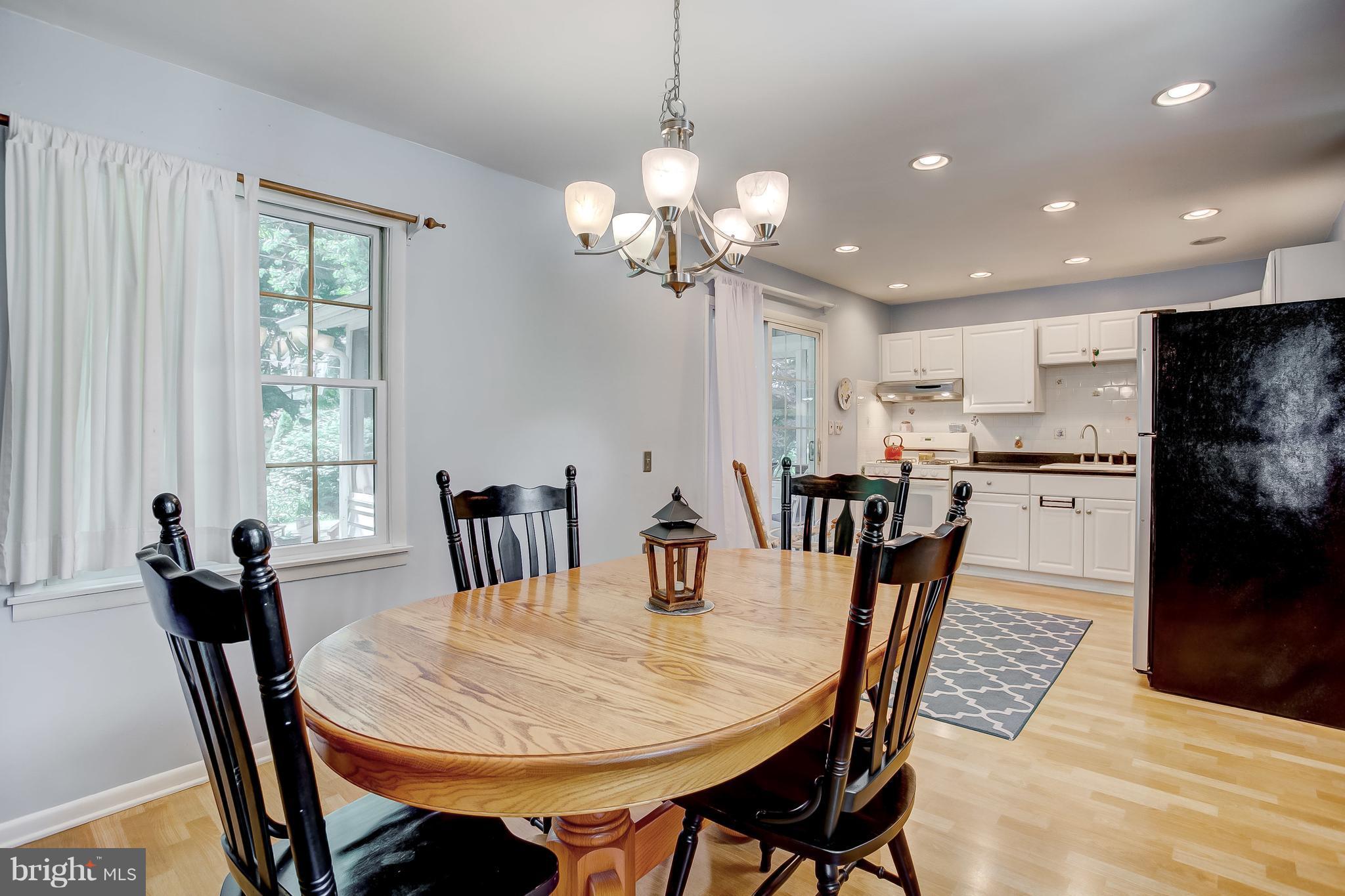 332 Timber Grove Road Reisterstown, MD 21136 - Photo 9 of 23 a view of a dining room with furniture
