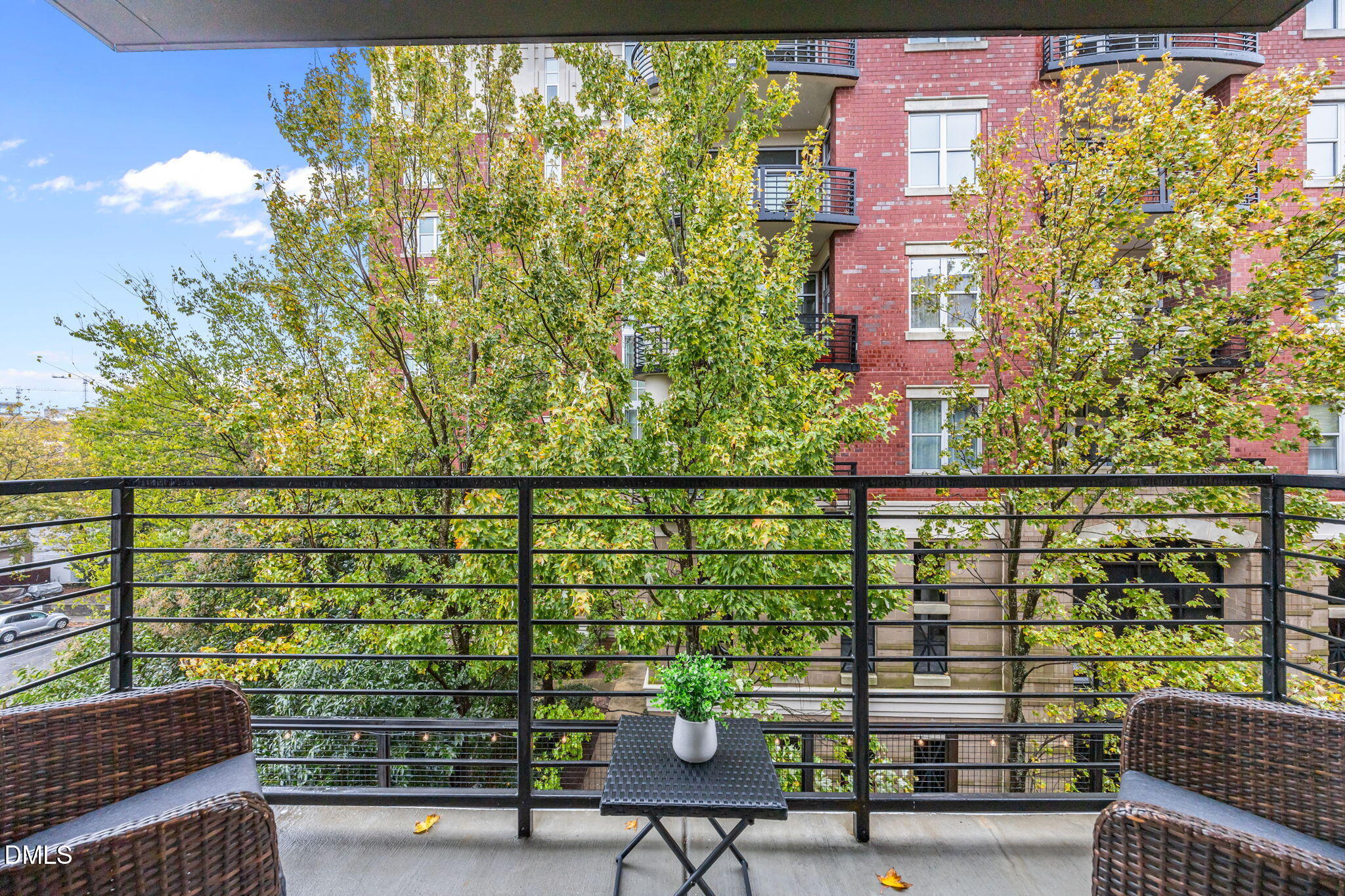 615 West Peace Street, Unit 308 Raleigh, NC 27605 - Photo 10 of 25 a balcony with street view