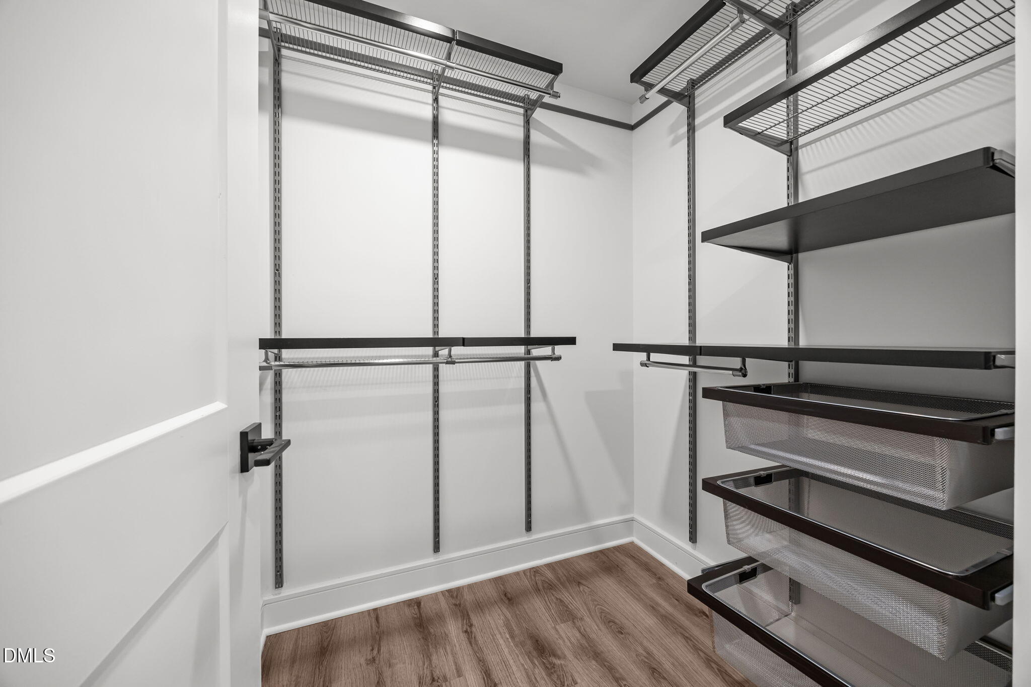 615 West Peace Street, Unit 308 Raleigh, NC 27605 - Photo 16 of 25 a view of a room with racks on the wall