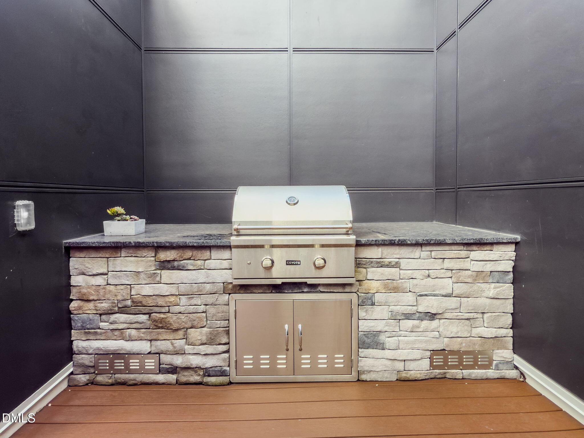615 West Peace Street, Unit 308 Raleigh, NC 27605 - Photo 22 of 25 a stove top oven sitting inside of a kitchen