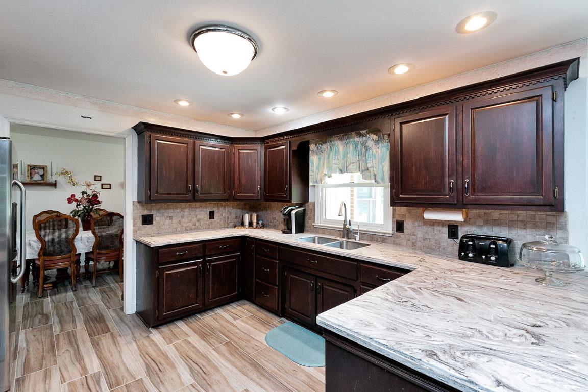 444 Horn Springs Road Lebanon, TN 37087 - Photo 11 of 30 22x12 Kitchen/Dinette. Coran Swirl countertops.