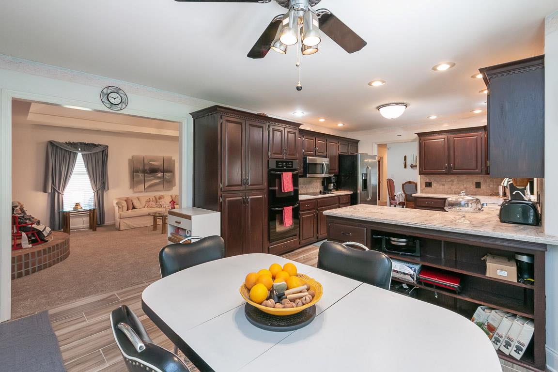 444 Horn Springs Road Lebanon, TN 37087 - Photo 13 of 30 Notice the storage on back side of the counters and Lg Pantry