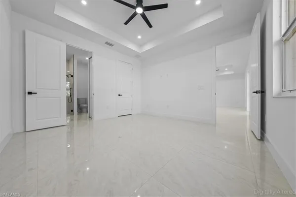 a view of a livingroom with a ceiling fan