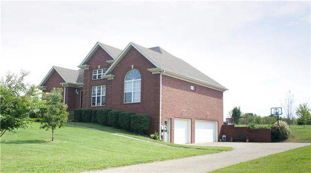 82 Bradshaw Road Lebanon, TN 37087 - Photo 11 of 20 a front view of a house with a yard