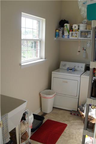 82 Bradshaw Road Lebanon, TN 37087 - Photo 18 of 20 a utility room with dryer and washer